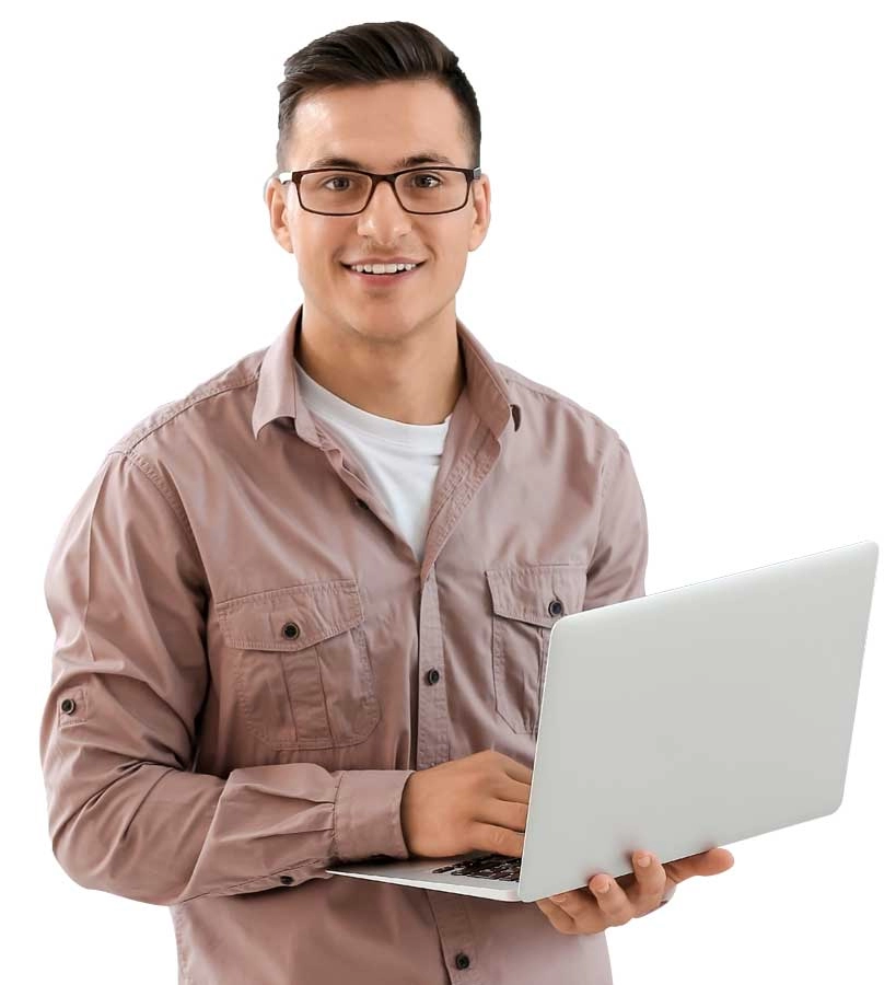 Man smiling and holding a laptop